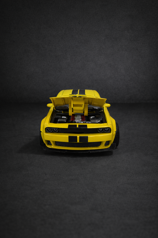 Dodge Challenger- Metal diecast 1:36 scale yellow with black.