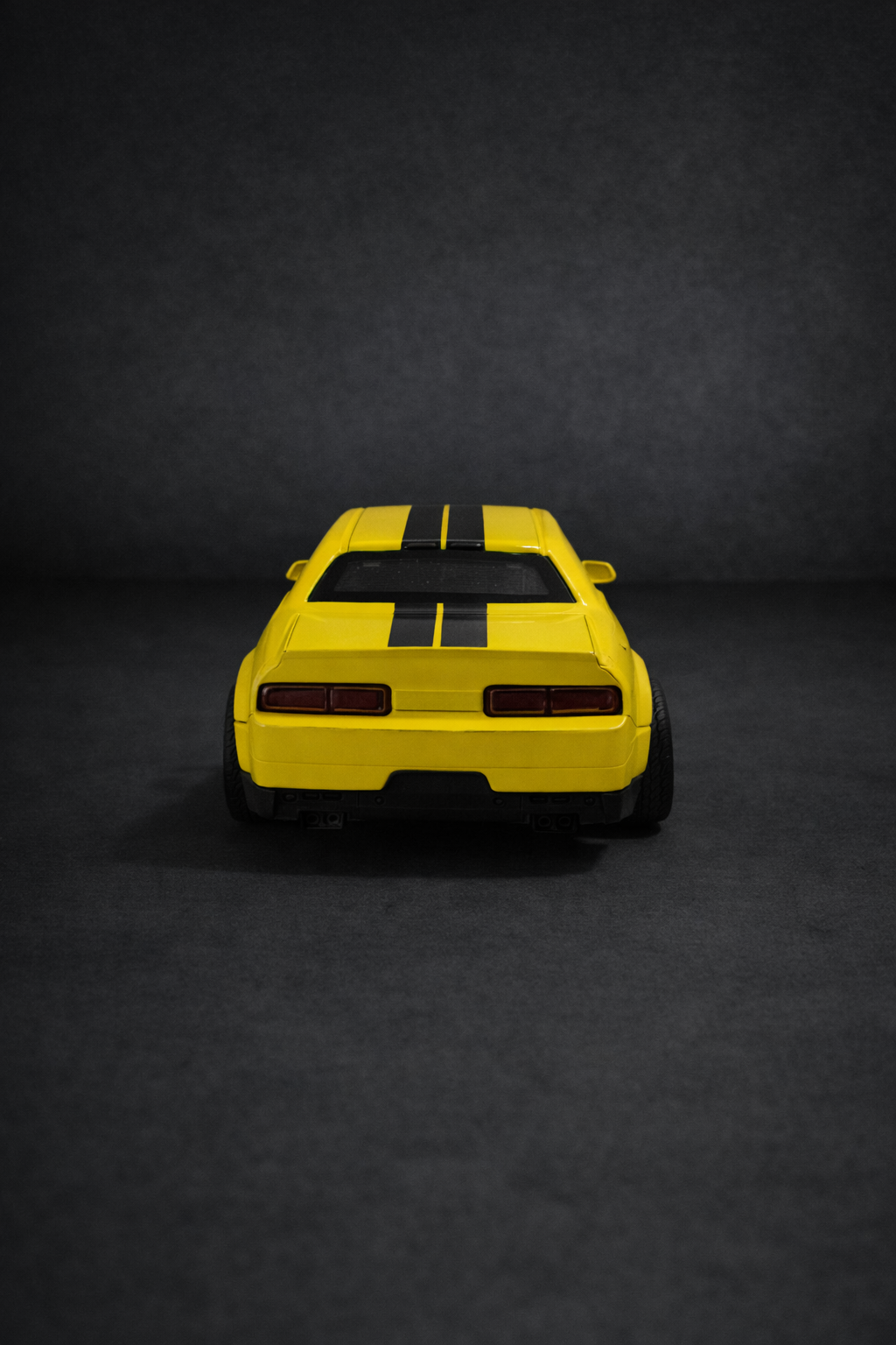 Dodge Challenger- Metal diecast 1:36 scale yellow with black.
