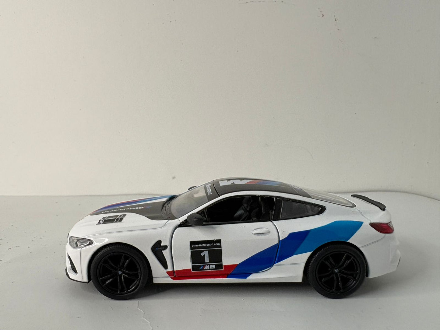 Kinsmart 1:38 scale BMW M8 Competition Coupe.